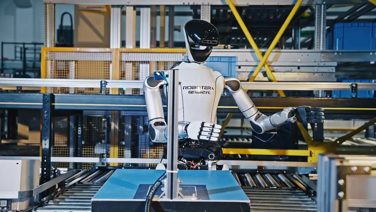 The upper body of the Robotera Star-Act L7 humanoid robot standing at a conveyor belt workstation.