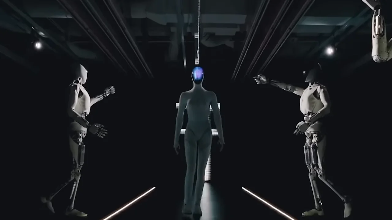 The new female-styled Xpeng Iron robot walks down the center of the stage, flanked on both sides by a row of stationary, earlier-generation Xpeng robots. The sleek, white-suited new model contrasts sharply with the exposed mechanical chassis and more industrial design of the older units standing in the background.