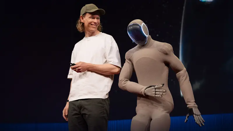 1X CEO Bernt Børnich with the NEO Gamma humanoid on the TED stage