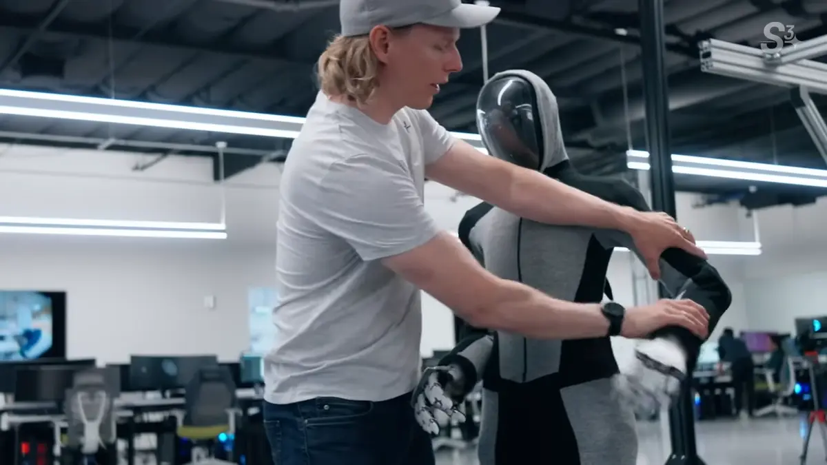 Bernt Børnich of 1X showcasing the safe nature of the NEO Beta humanoid robot