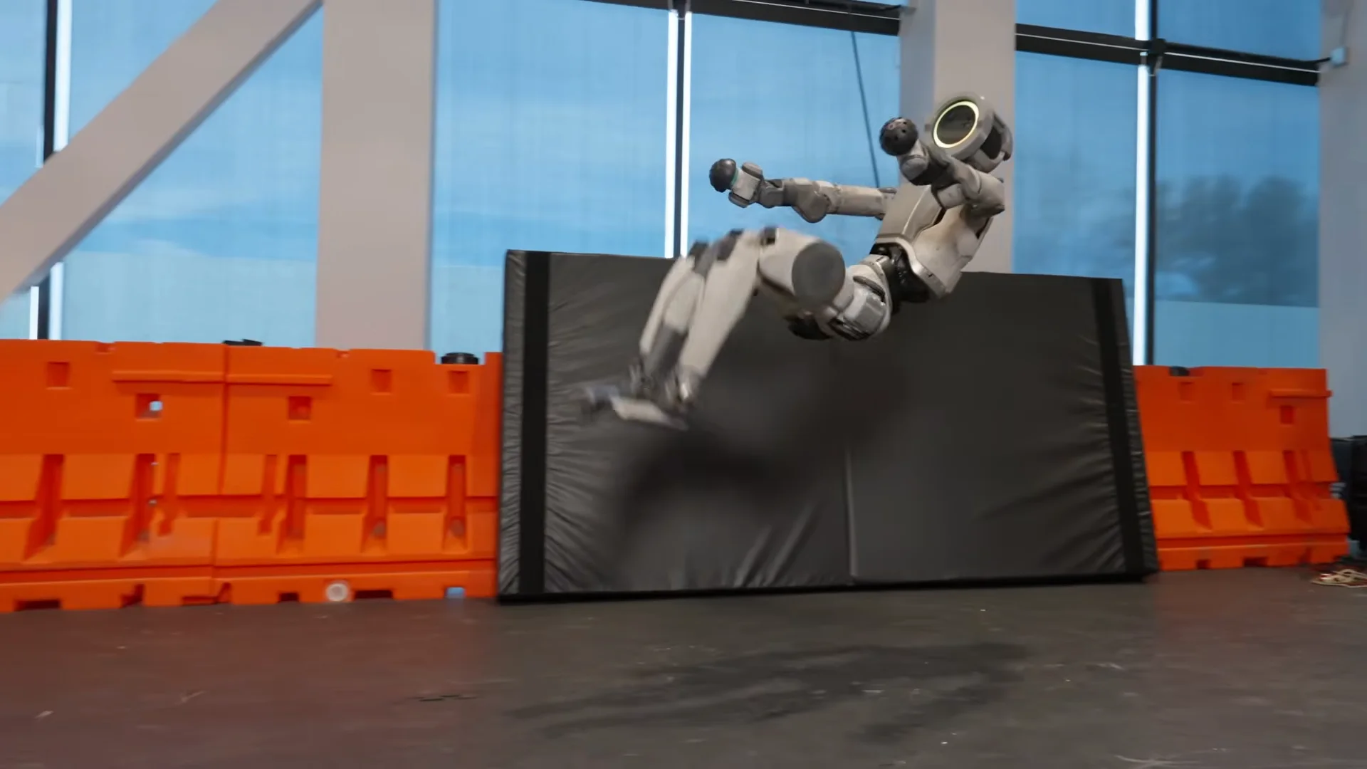 The research version of the Boston Dynamics Atlas robot captured mid-air while performing a cartwheel and backflip combination.