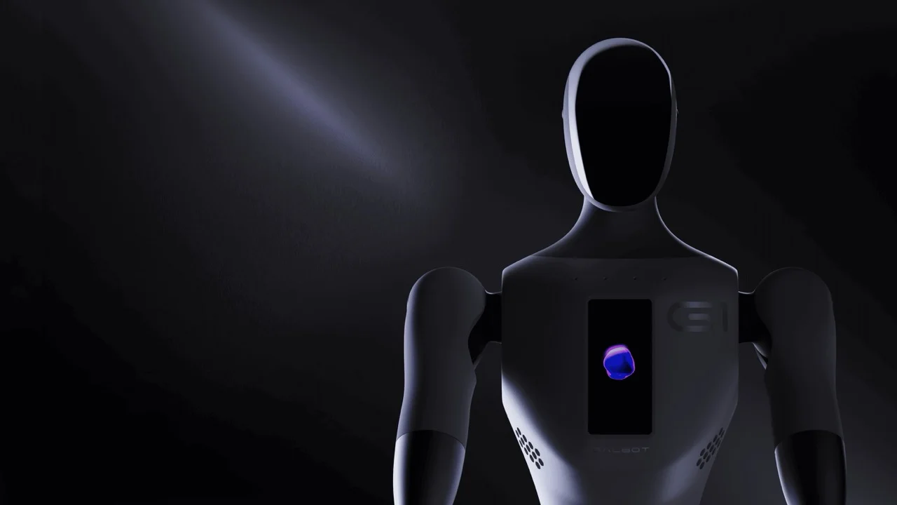 A moody studio close-up of the Galbot G1 humanoid robot against a black background, featuring a smooth, featureless head and a vertical chest display showing a purple graphic.