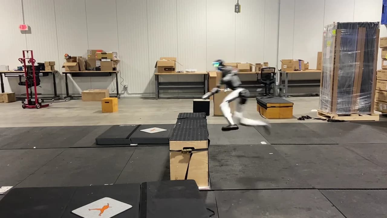 A Unitree G1 humanoid robot mid-vault over a wooden obstacle box, showcasing the dynamic movement capabilities of the Perceptive Humanoid Parkour (PHP) framework.