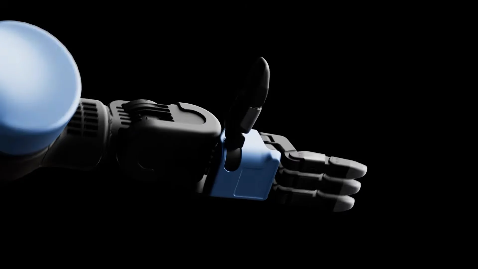 A side-profile close-up of the Atlas robot's hand, showing three fingers extended horizontally and a black thumb positioned vertically.